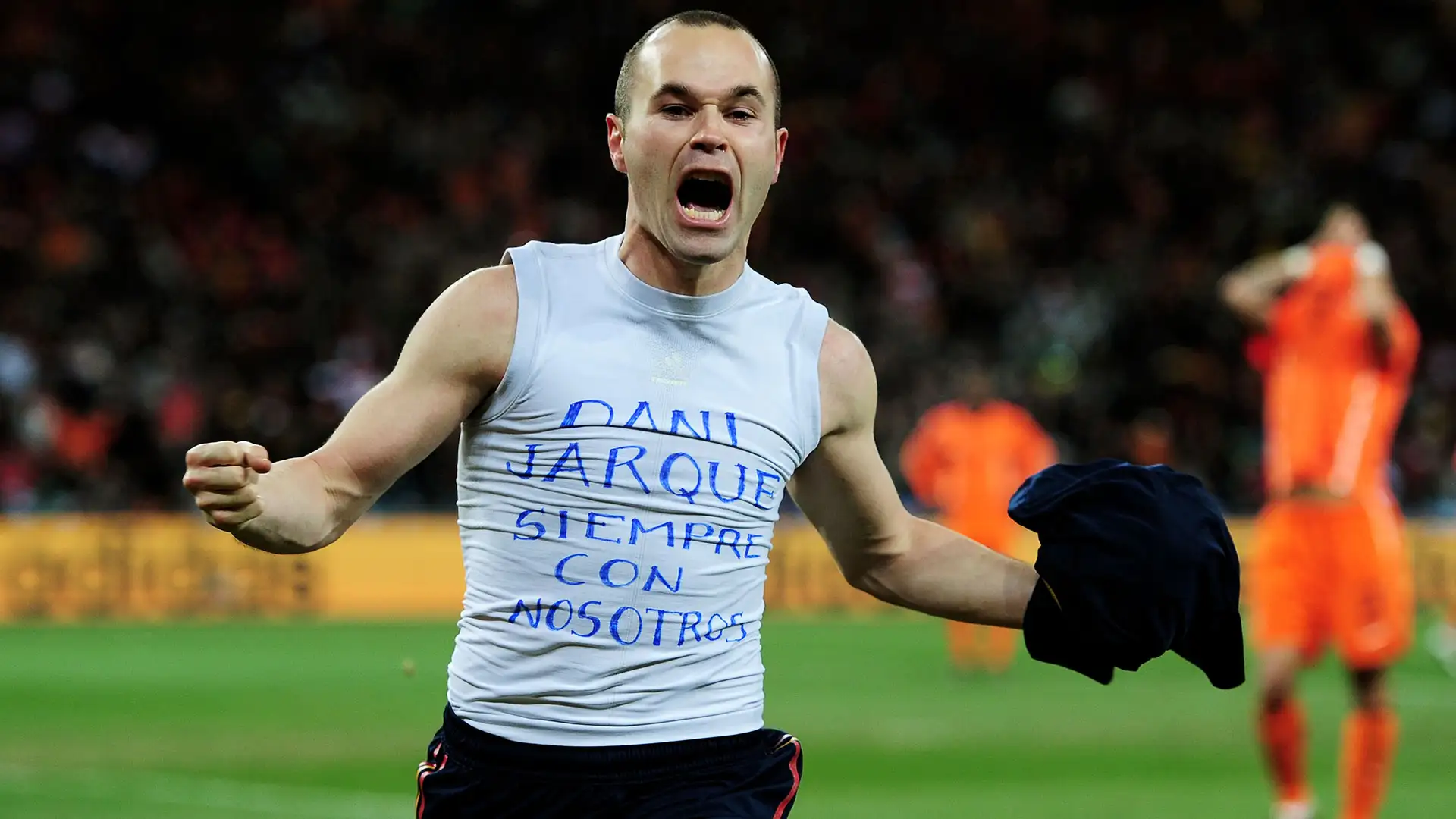Andrés Iniesta celebrating after scoring Spain's winning goal in the 2010 FIFA World Cup Final.