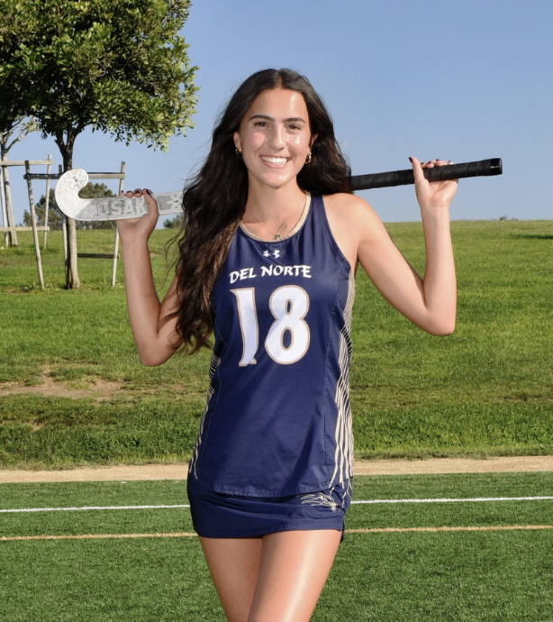 Claire Guier smiling in a field hockey uniform