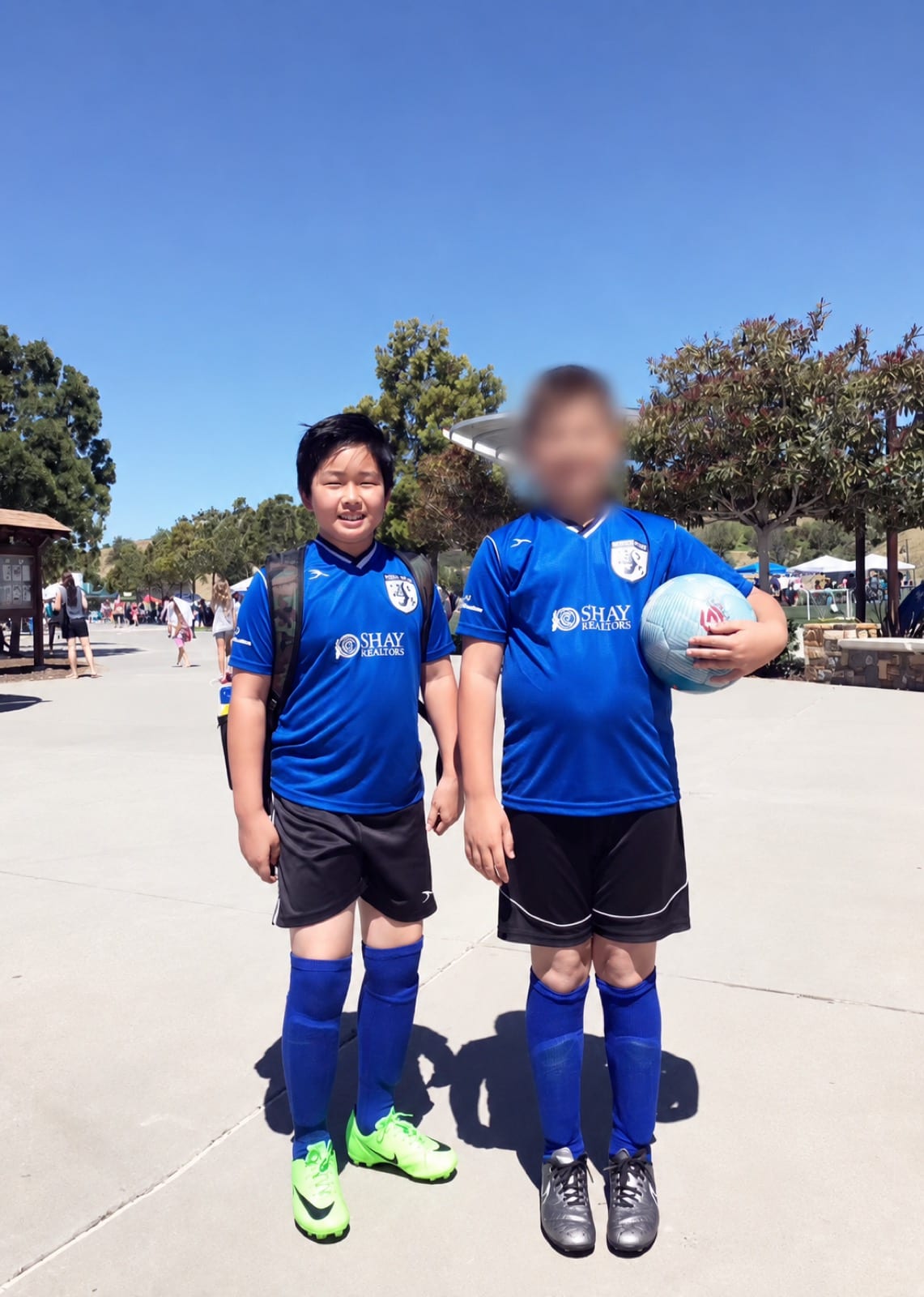 Jonathan as a child in a recreational soccer uniform