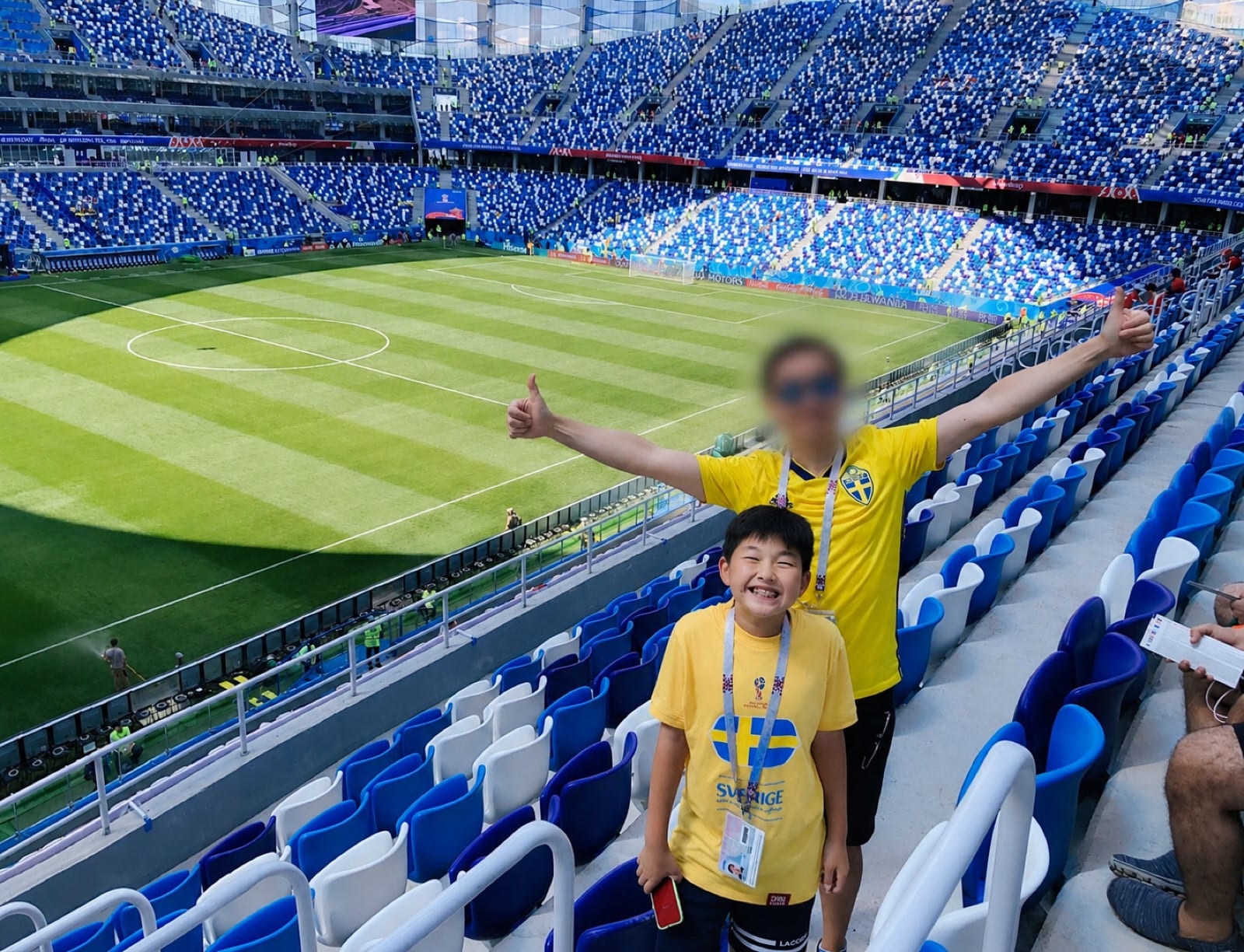 Jonathan as a child at a soccer stadium