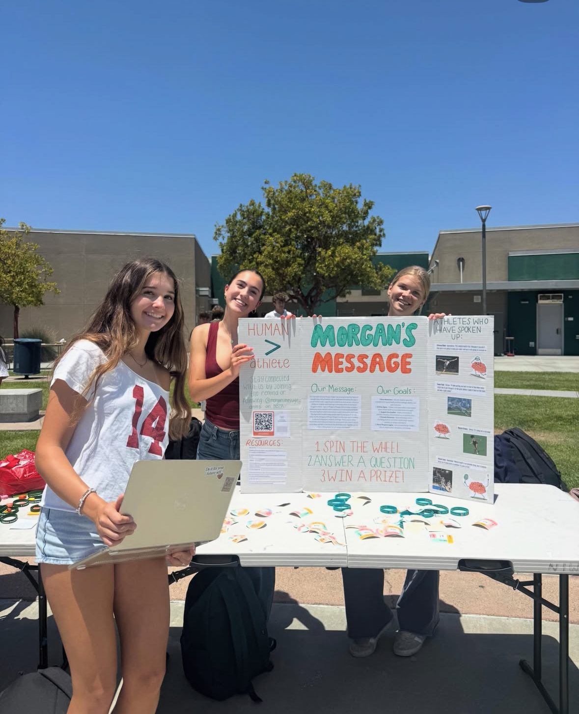 Morgan's Message DNHS display board with student-athlete mental health resources and table materials