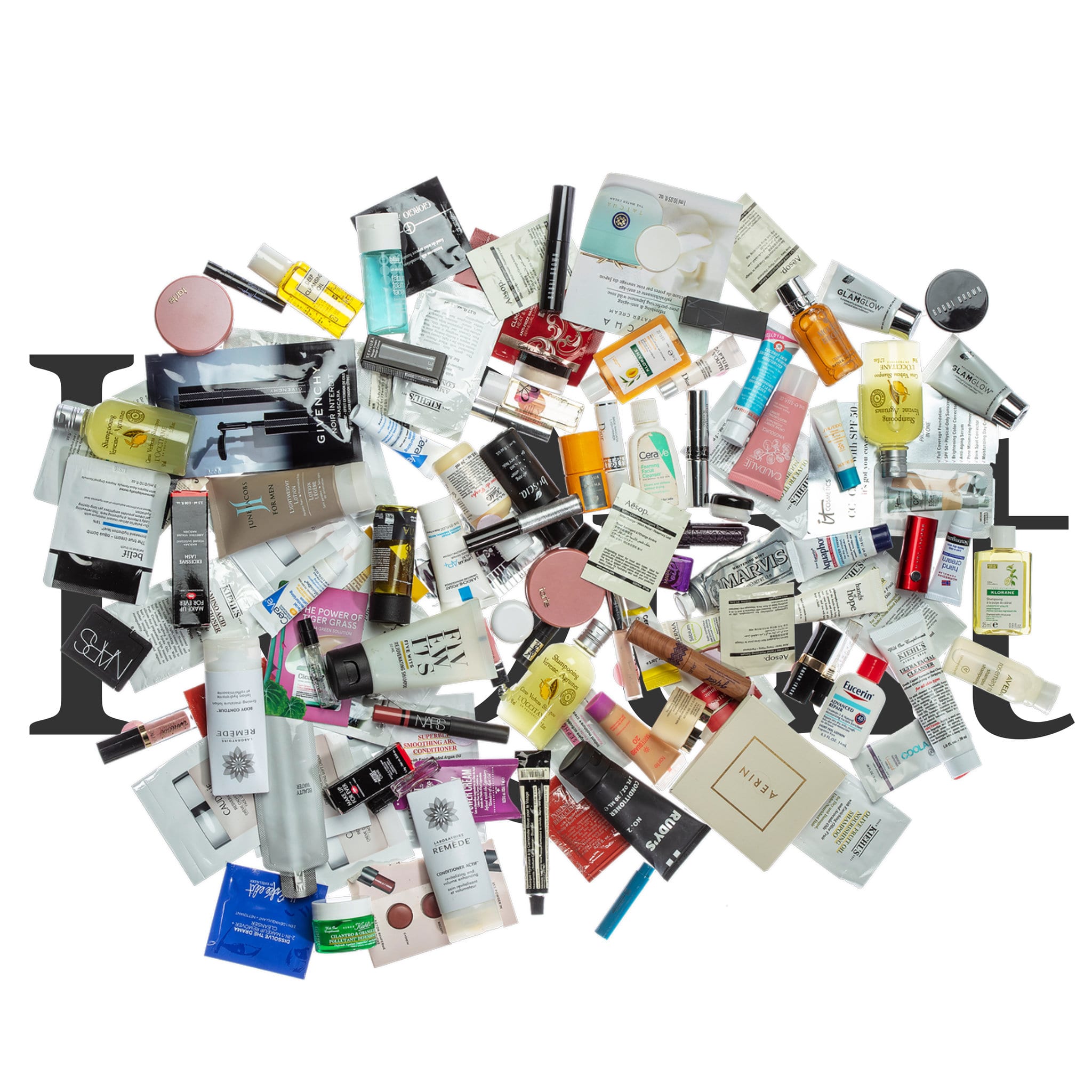 A large arrangement of skincare and beauty products photographed on a white background